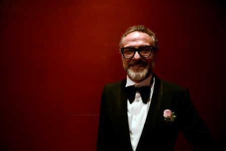 Massimo Bottura, the chef patron of Osteria Francescana restaurant in Italy, poses after receiving the award for Best Restaurant during the World's 50 Best Restaurants Awards at the Palacio Euskalduna in Bilbao, Spain, June 19, 2018. REUTERS/Vincent West