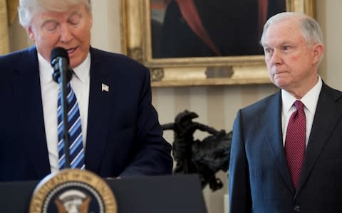 Donald Trump and Jeff Sessions, his first attorney general, fell out spectacularly over the Russian election meddling probe - Credit: SAUL LOEB/AFP/Getty Images