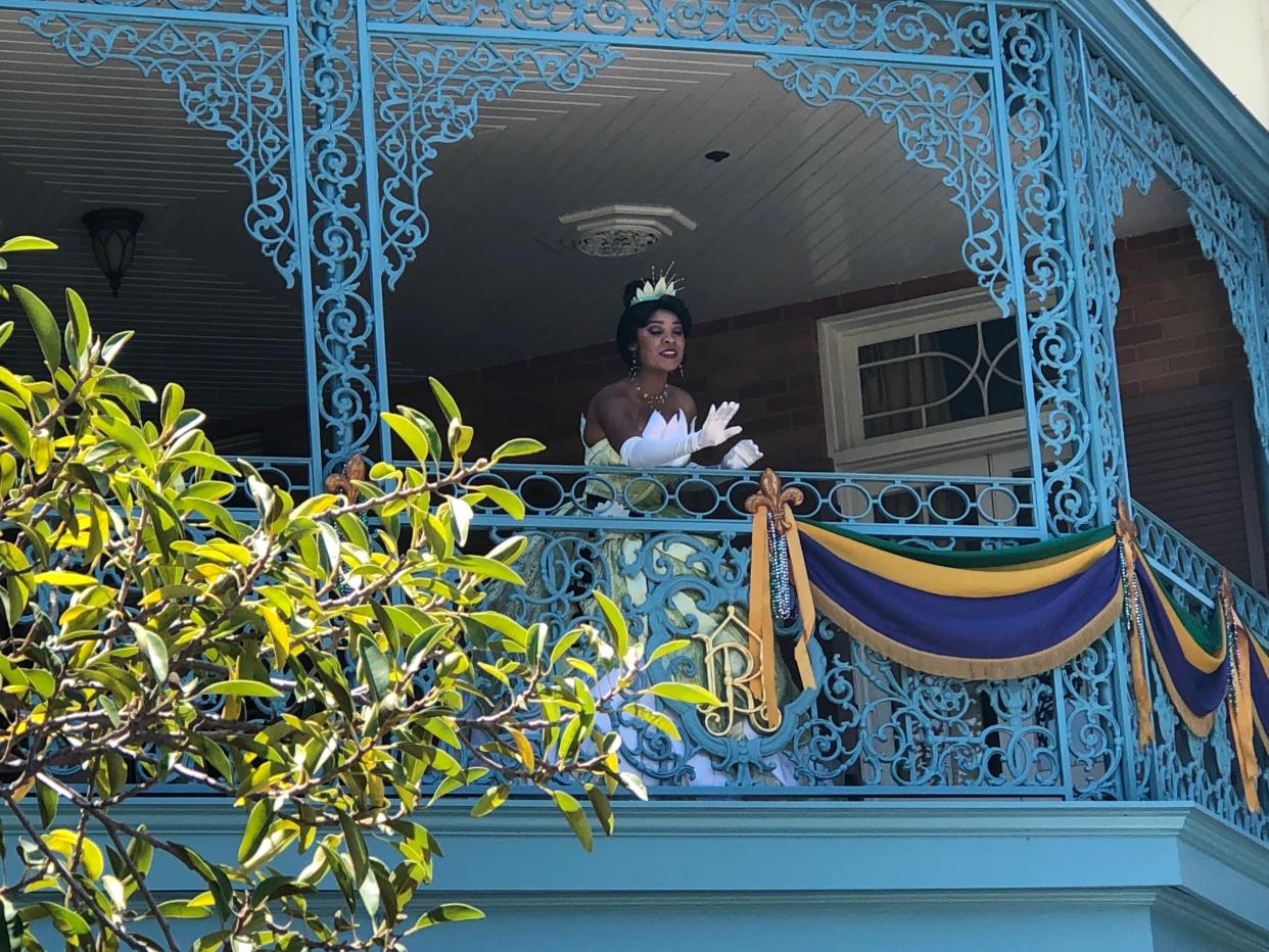 Princess Tiana on a balcony at Disneyland