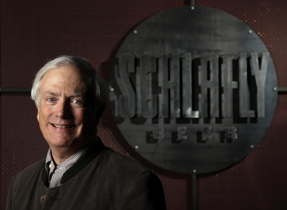 Tom Schlafly, co-founder of the brewery which produces the Schlafly brand of beers, poses for a photo at Schlafly Bottleworks on Wednesday, March 12, 2014, in Maplewood, Mo. Schlafly has been in a trademark dispute with his aunt, conservative activist Phyllis Schlafly, over whether Schlafly is primarily a last name or a commercial brand that deserves legal protection. (AP Photo/Jeff Roberson)