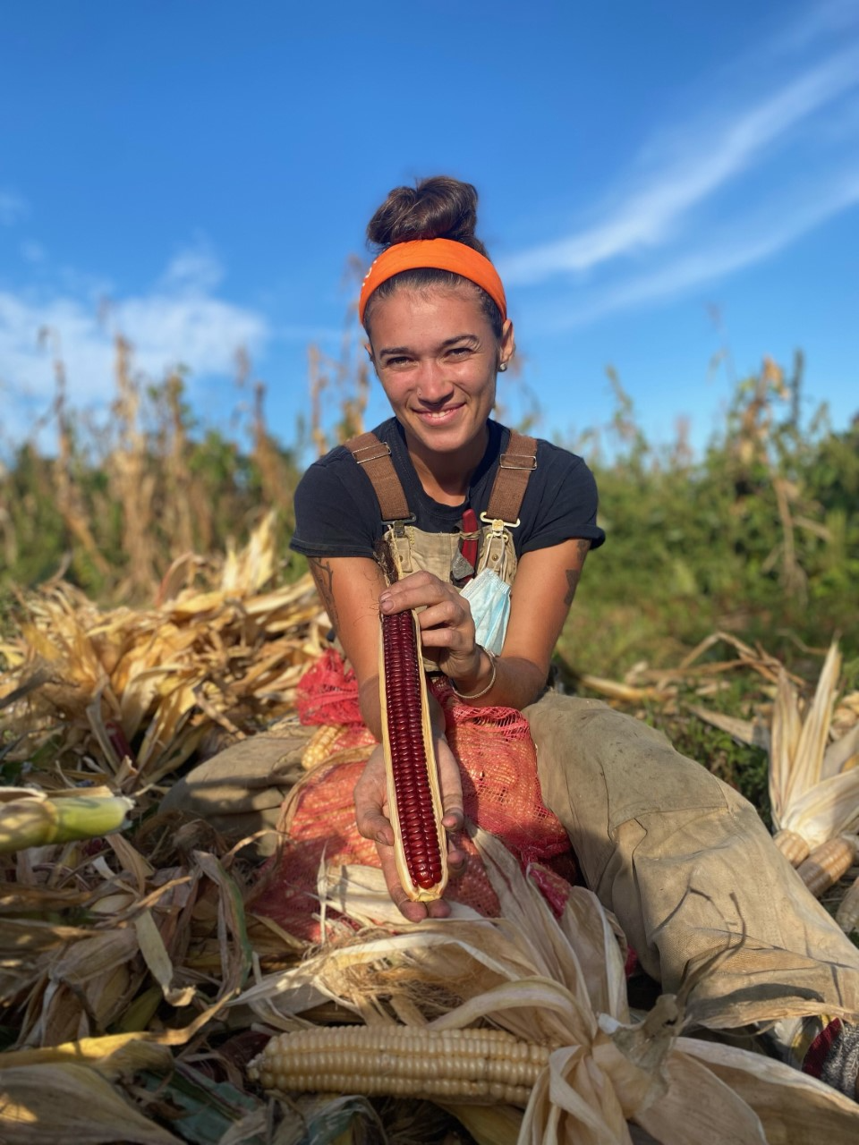 Keely Curliss, a member of the Hassanamisco Band of the Nipmuc Tribe, works in farms across Central Massachusetts. She holds a variety of corn she has worked to return to the tribe.