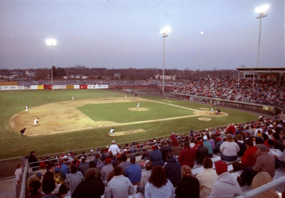 The first pitch is thrown in the Canton-Akron home opener at Thurman Munson Memorial Stadium in Canton on Wednesday, April 19, 1989. Deion Sanders, the future Pro Football Hall of Fame cornerback, is the first batter for the Albany-Colonie Yankees.