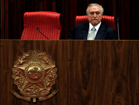 Brazil's interim President Michel Temer reacts during the inauguration ceremony of Gilmar Mendes (not in the picture) as the new president of the Superior Electoral Court in Brasilia, Brazil, May 12, 2016. REUTERS/Paulo Whitaker