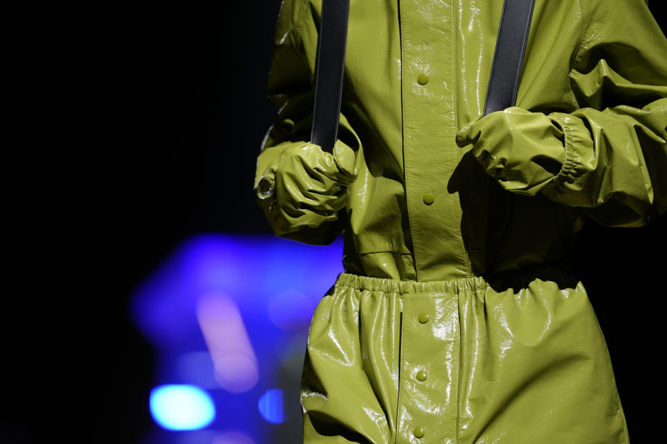 A model wears a creation as part of the Prada men's Fall-Winter 2022-23 collection, unveiled during the Fashion Week in Milan, Italy, Sunday, Jan. 16, 2022. (AP Photo/Luca Bruno)