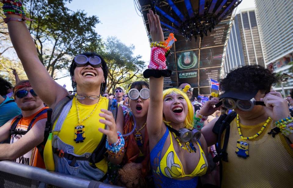 From left to right: Kevin Lin, Tiffany Dang, Harmonie Phan, and Josh Padua, dressed as minions, dance to ARMNHMR’s set during Ultra Day 3 on Sunday, March 24, 2024, at Worldwide Stage inside Bayfront Park in downtown Miami.