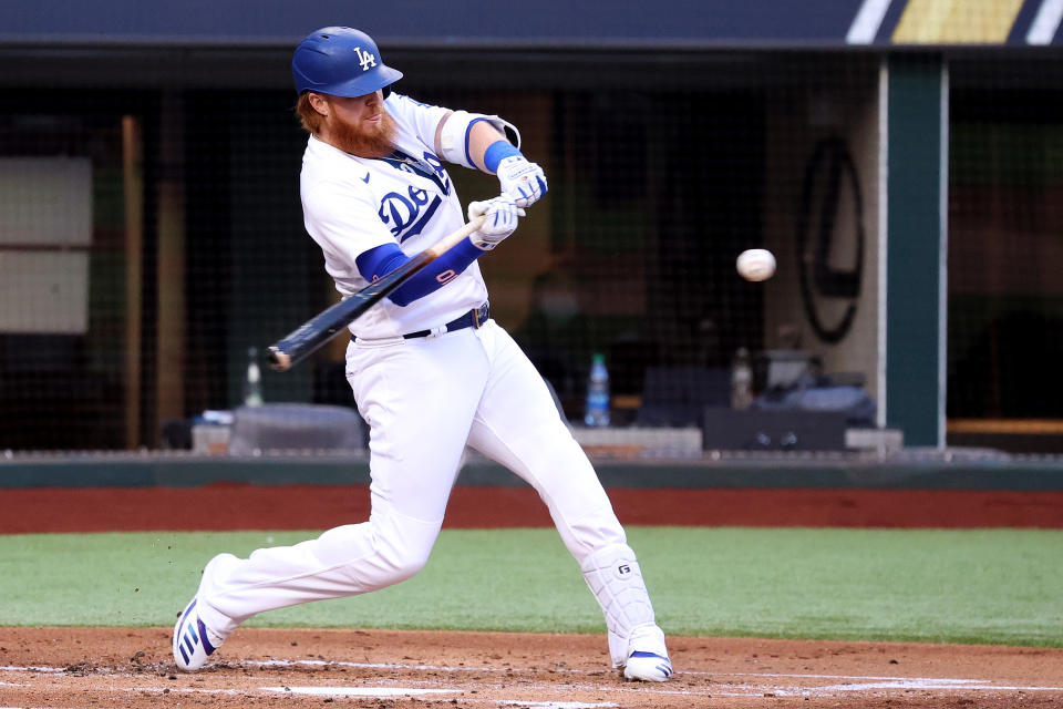 ARLINGTON, TEXAS - OCTOBER 13:  Justin Turner #10 of the Los Angeles Dodgers swings at a pitch against the Atlanta Braves during the first inning in Game Two of the National League Championship Series at Globe Life Field on October 13, 2020 in Arlington, Texas. (Photo by Joseph Israwi/Getty Images)
