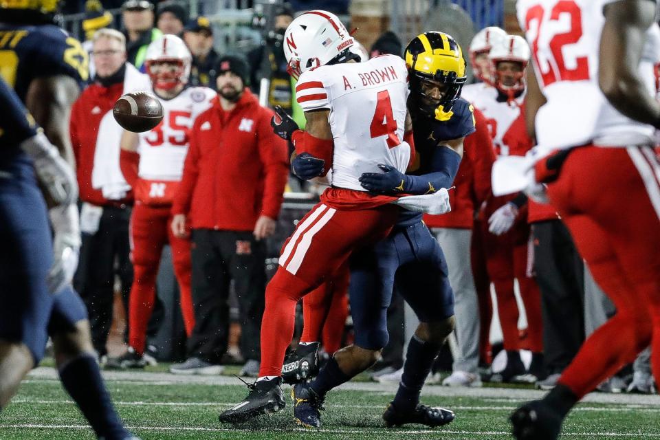 Michigan defensive back Will Johnson tackles Nebraska defensive back Myles Farmer during the second half of U-M's 34-3 win over Nebraska on Saturday, Nov. 12, 2022, in Ann Arbor.