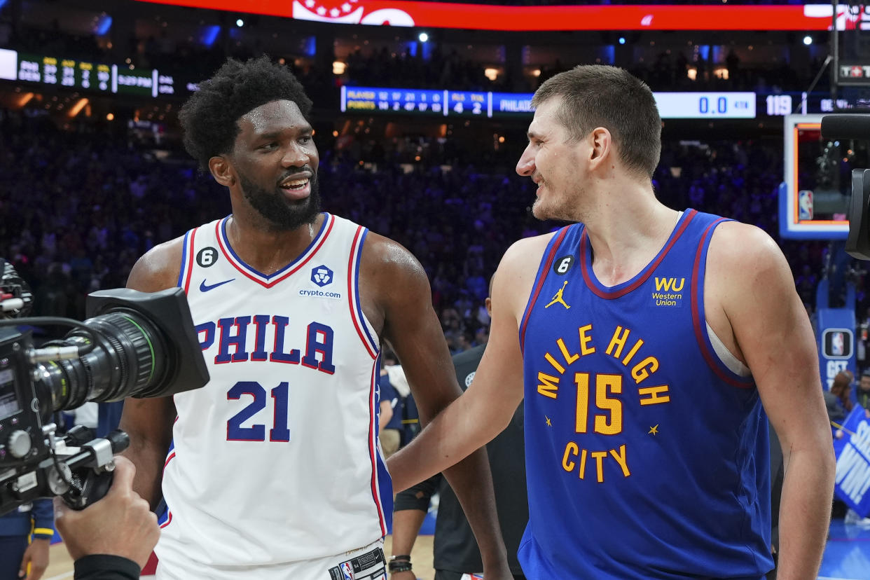 Nikola Jokic and Joel Embiid square off in Denver on Monday night. (Photo by Mitchell Leff/Getty Images)