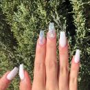 <p>Instead of painting your <a href="https://www.cosmopolitan.com/style-beauty/beauty/a51248/coffin-nails-nail-art/" rel="nofollow noopener" target="_blank" data-ylk="slk:coffin nails;elm:context_link;itc:0;sec:content-canvas" class="link ">coffin nails</a> all white next time you head to the salon, ask your technician for a few clear nails with embedded gold and silver snowflakes for a melted effect.</p><p><a href="https://www.instagram.com/p/B20rYRzBp7A/" rel="nofollow noopener" target="_blank" data-ylk="slk:See the original post on Instagram;elm:context_link;itc:0;sec:content-canvas" class="link ">See the original post on Instagram</a></p>