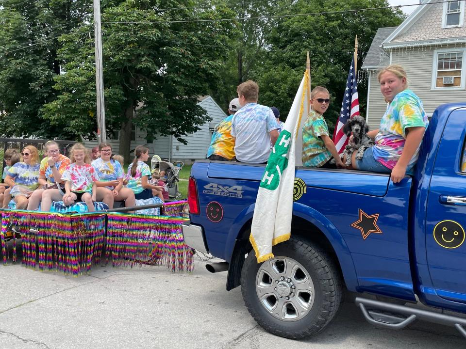 Members of the Woodville Buckeyes 4-H Club on their float in the 2021 Fourth of July Parade.