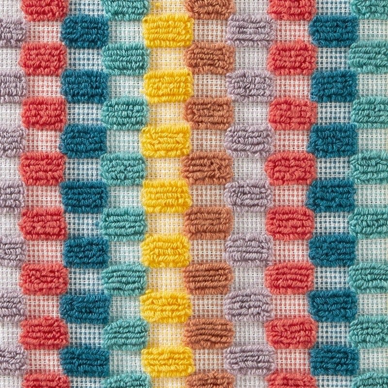 Close-up of a multi-colored woven fabric texture