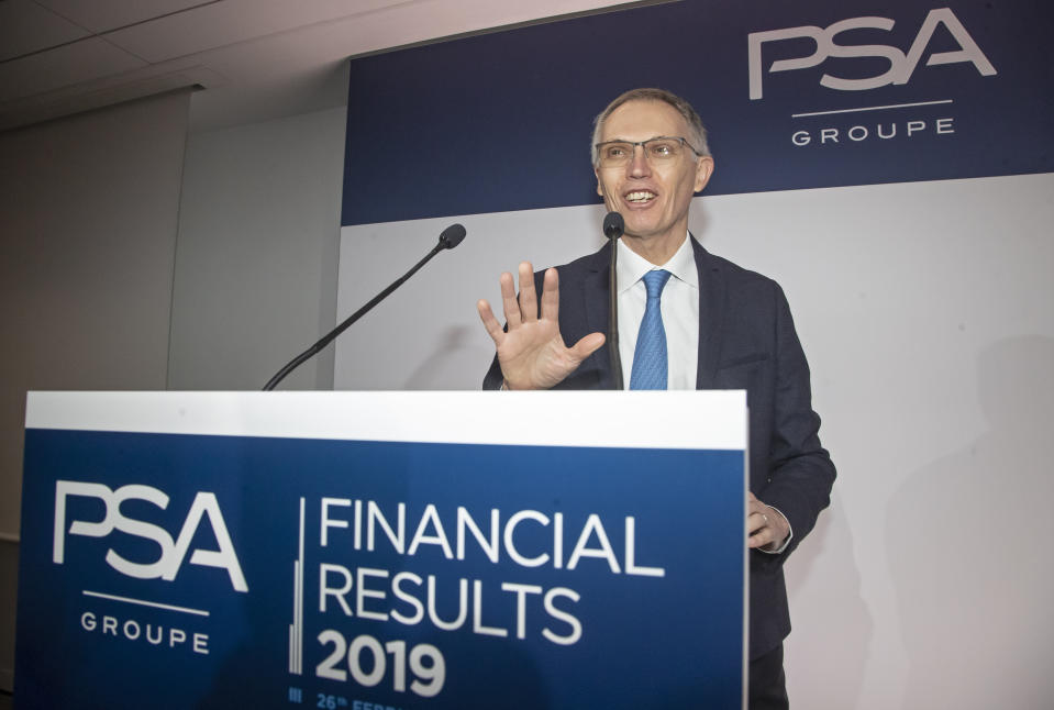 CEO of PSA Groupe Carlos Tavares arrives for the presentation of the company's 2019 full year results, in Rueil-Malmaison, west of Paris, Wednesday, Feb. 26, 2020. The French carmaker announced a new profitability record in 2019. (AP Photo/Michel Euler)