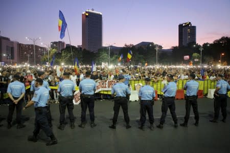 Thousands of people protest against the Romanian government in central Bucharest