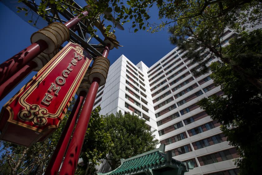 Los Angeles, CA - August 26: Exterior of the 38-year-old Cathay Manor's apartment on Friday, Aug. 26, 2022, in Los Angeles, CA. For decades, living conditions at Cathay Manor Apartments have deteriorated as its elderly, low-income residents have grown more isolated amid the rising rents and gentrification of booming Chinatown. (Francine Orr / Los Angeles Times)