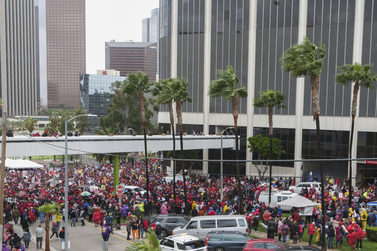 Thousands of Los Angeles Unified School District teachers and Service Employees International Union 99 (SEIU) members rally outside the LAUSD headquarters in Los Angeles, Tuesday, March 21, 2023. Tens of thousands of workers in the Los Angeles Unified School District walked off the job Tuesday over stalled contract talks, and they were joined by teachers in a three-day strike that shut down the nation's second-largest school system. (AP Photo/Damian Dovarganes)