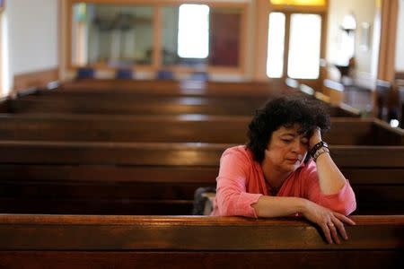 Immigrant Rosa Sabido sits in the United Methodist Church in which she lives while facing deportation in Mancos, Colorado, U.S., July 19, 2017. REUTERS/Lucy Nicholson/Files