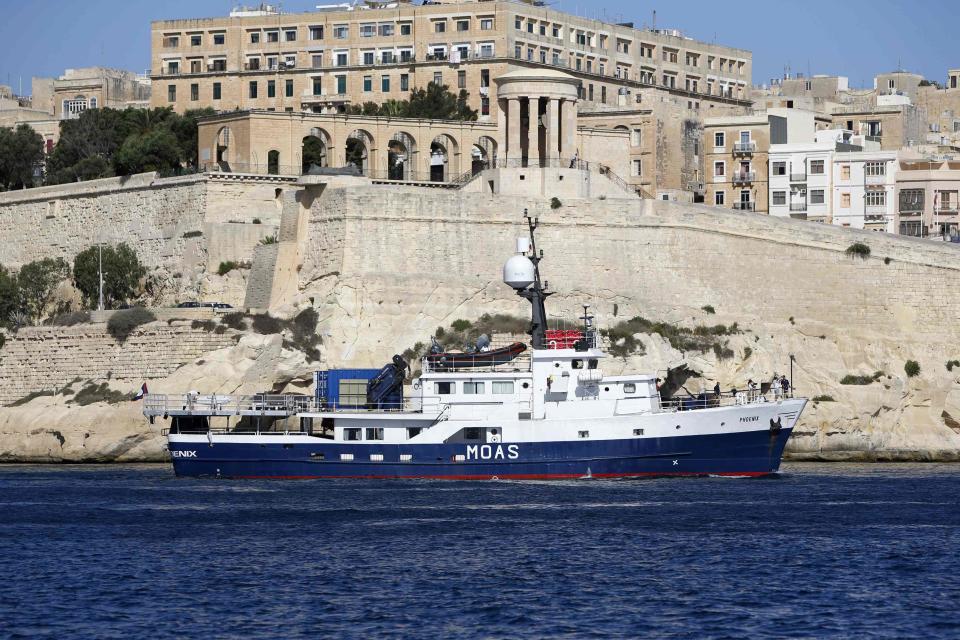 Phoenix I, the expedition vessel of the Migrant Offshore Aid Station (MOAS) project, sails out of Valletta's Grand Harbour for its first 20-day mission, August 25, 2014. The privately-funded humanitarian project initiated by Malta-based Christopher and Regina Catrambone, seeks to mitigate the loss of human lives by migrants attempting to cross the Mediterranean Sea into Europe. The Catrambones said they felt compelled to act following an appeal by Pope Francis after several hundred African migrants drowned off the Italian island of Lampedusa in October 2013. REUTERS/Darrin Zammit Lupi (MALTA - Tags: SOCIETY IMMIGRATION MARITIME) MALTA OUT. NO COMMERCIAL OR EDITORIAL SALES IN MALTA