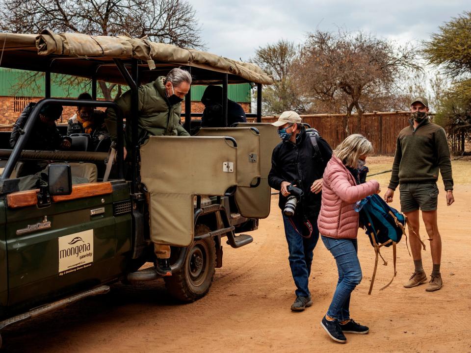 Tourists wearing face masks during a guided safari tour near Pretoria, South Africa (AFP via Getty Images)