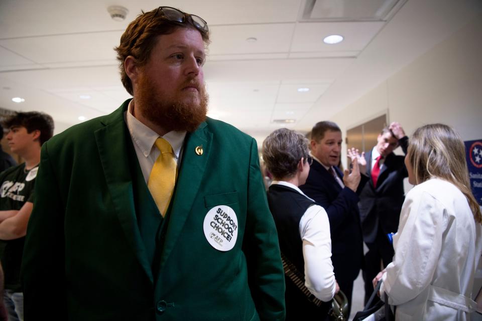 Trey Creek, West Tennessee director for Americans for Prosperity, waits outside the Senate committee meeting before the school voucher bill was debated on March 6.