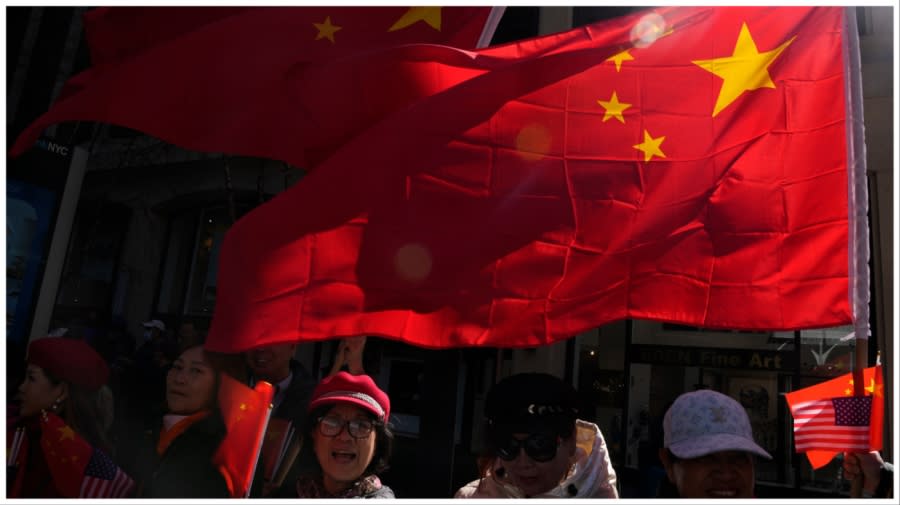 <em>Protesters opposed to Taiwanese independence gather at a hotel where Taiwanese President Tsai Ing-wen is expected to arrive in New York, Wednesday, March 29, 2023. (AP Photo/Seth Wenig)</em>