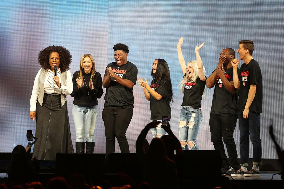 Oprah Winfrey speaks with the cast of Netflix's "Cheer", (L-R) Monica Aldama, Jerry Harris, Gabi Butler, Lexi Brumback, TT Barker and Dillon Brandt during Oprah's 2020 Vision: Your Life in Focus Tour presented by WW (Weight Watchers Reimagined) at American Airlines Center on February 15, 2020 in Dallas, Texas.