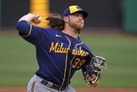 Milwaukee Brewers starting pitcher Corbin Burnes delivers during the first inning of the team's baseball game against the Pittsburgh Pirates in Pittsburgh, Friday, July 1, 2022. (AP Photo/Gene J. Puskar)