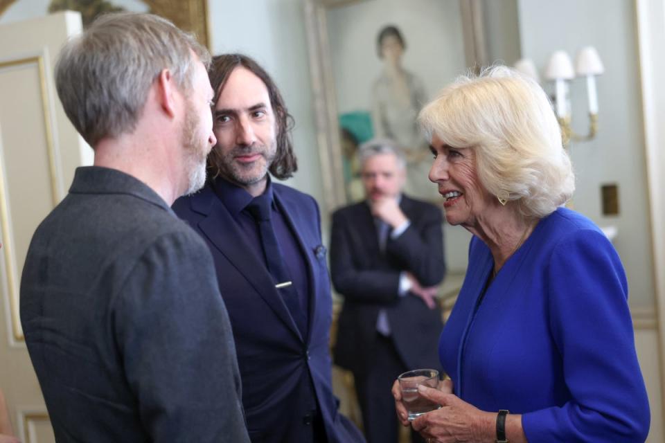 Queen Consort Camilla speaks to authors Paul Murray (left) and Paul Lynch (centre). (Chris Jackson/PA) (PA Wire)