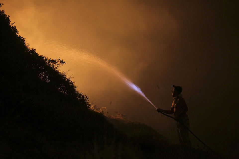 Wildfires burn out of control in Portugal and Spain