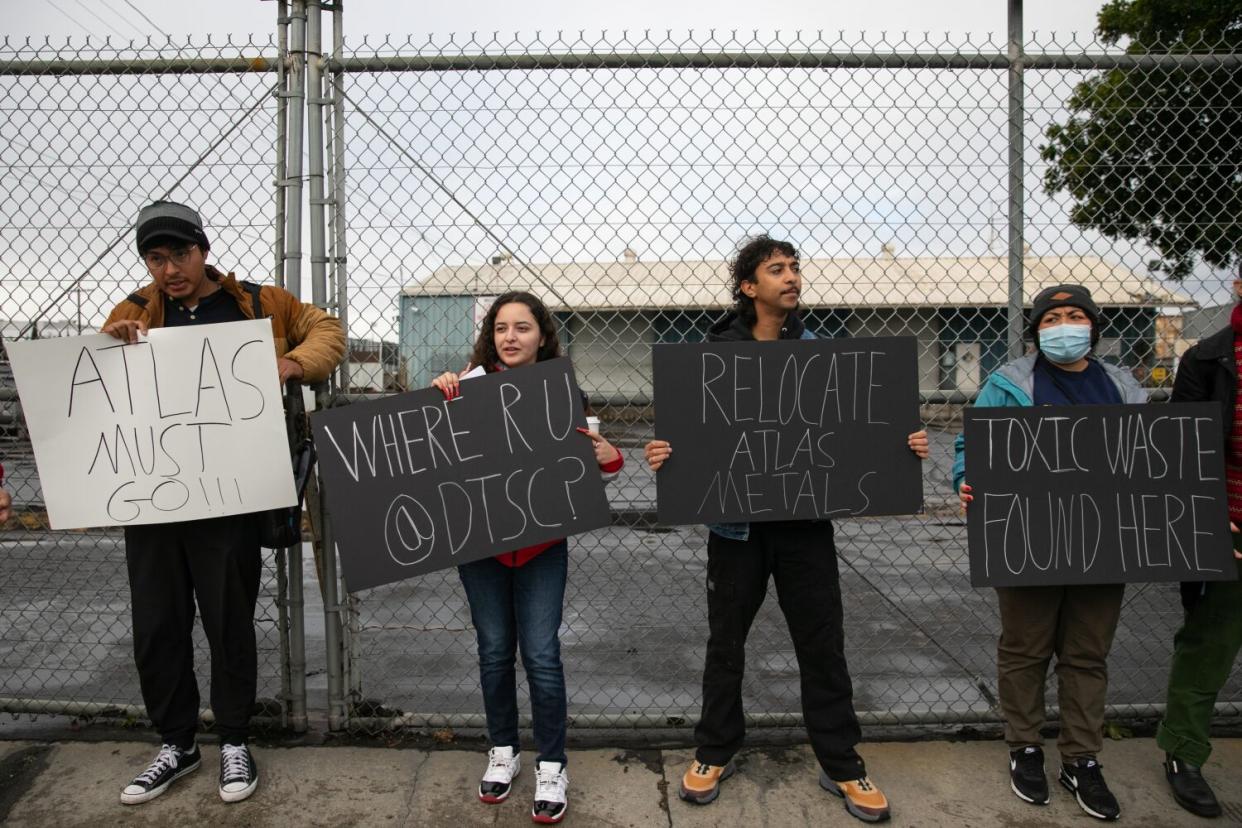 Jordan High School students and community members protest in front of Atlas Iron and Metal Company