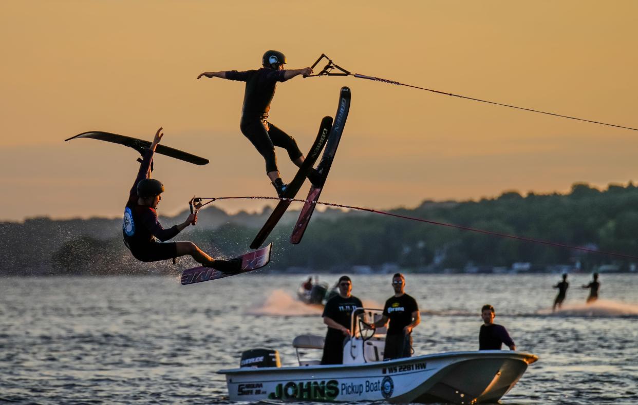 Members of the safety crew watch carefully as a jumper loses control during the Pewaukee Lake Water Ski Club's weekly show at Lakefront Park, Thursday, July 20, 2023.