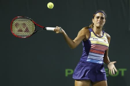 Mar 23, 2018; Key Biscayne, FL, USA; Monica Puig of Puerto Rico hits a forehand against Caroline Wozniacki of Denmark (not pictured) on day four of the Miami Open at Tennis Center at Crandon Park. Mandatory Credit: Geoff Burke-USA TODAY Sports