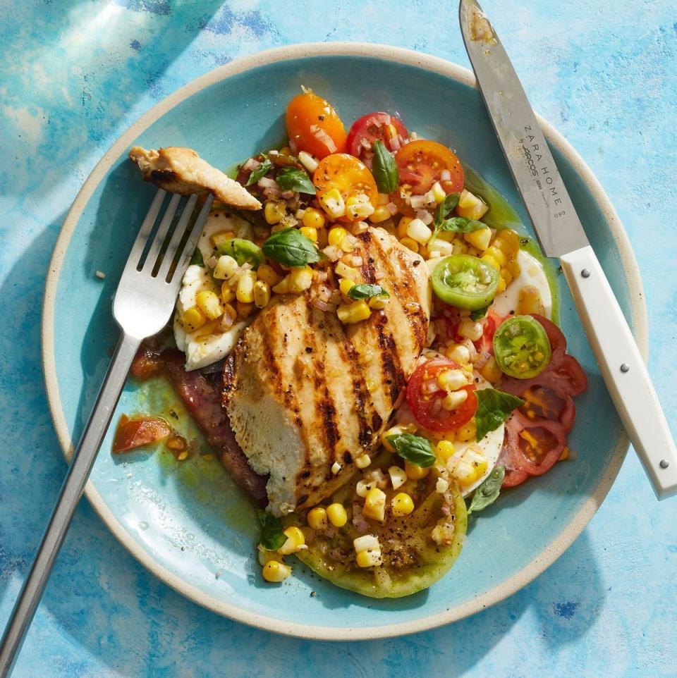 <p>Turn the classic <a href="https://www.goodhousekeeping.com/food-recipes/healthy/g2128/summer-salads/" rel="nofollow noopener" target="_blank" data-ylk="slk:summery salad;elm:context_link;itc:0;sec:content-canvas" class="link ">summery salad</a> into a full meal with quick, flavorful grilled chicken breast.</p><p>Get the <strong><a href="https://www.goodhousekeeping.com/food-recipes/a40450543/grilled-chicken-caprese-recipe/" rel="nofollow noopener" target="_blank" data-ylk="slk:Grilled Chicken Caprese recipe;elm:context_link;itc:0;sec:content-canvas" class="link ">Grilled Chicken Caprese recipe</a></strong>. </p><p><strong>RELATED: </strong><a href="https://www.goodhousekeeping.com/food-recipes/easy/g2352/quick-summer-dinner-recipes/" rel="nofollow noopener" target="_blank" data-ylk="slk:77 Quick Summer Dinner Ideas for Easier Weeknights;elm:context_link;itc:0;sec:content-canvas" class="link ">77 Quick Summer Dinner Ideas for Easier Weeknights</a></p>