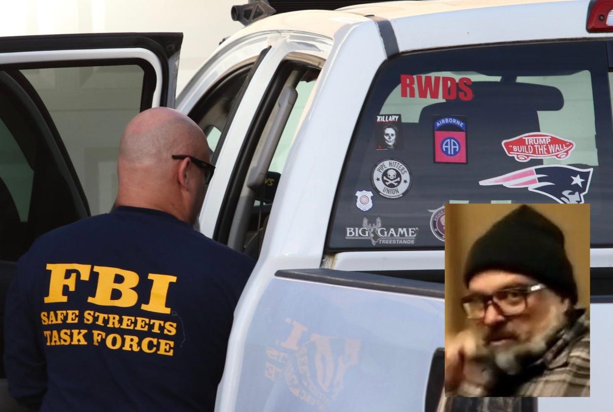 FBI agents search the truck of Joseph Biggs, suspected of entering the U.S. Capitol on Jan. 6.