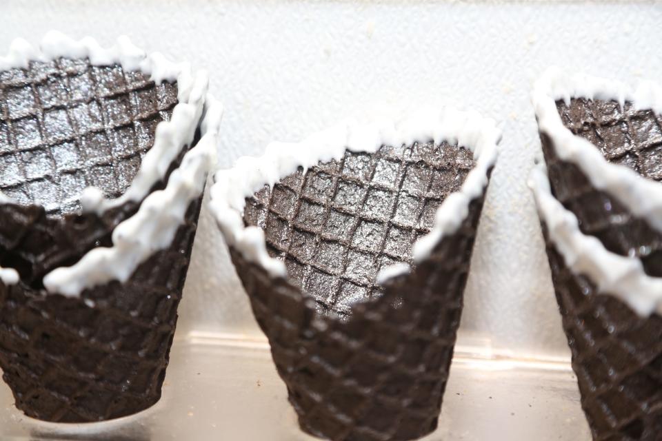 Morristown, NJ - April 3, 2024 -- Beenie's Ice Cream in Morristown is offering a black cocoa waffle cone with stardust (edible glitter) to commemorate the upcoming solar eclipse. They will also give a pair of eclipse glasses with the first 50 purchases of the eclipse cone.