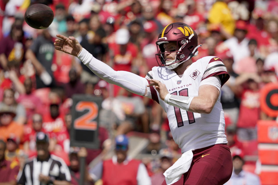 Washington Commanders quarterback Carson Wentz throws during the first half of an NFL preseason football game against the Kansas City Chiefs Saturday, Aug. 20, 2022, in Kansas City, Mo. (AP Photo/Ed Zurga)