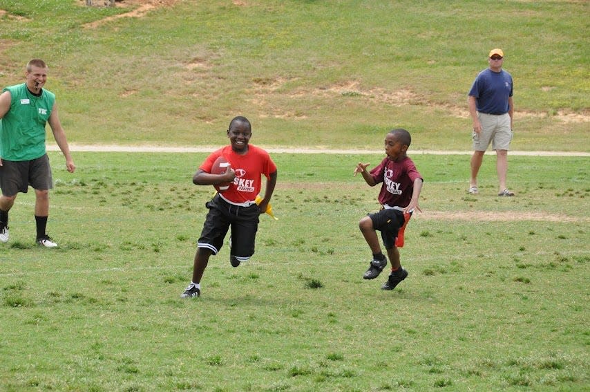 Ikem Ekwonu playing Pop Warner football.