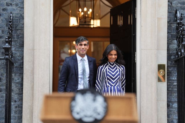 Rishi Sunak with his wife outside Downing Street 