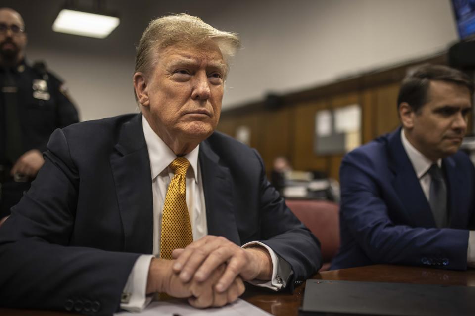 Former President Donald Trump sits in a courtroom next to his lawyer Todd Blanche, right, before the start of the day's proceedings in the Manhattan Criminal court, Tuesday, May 21, 2024, in New York. (Dave Sanders/The New York Times via AP, Pool)