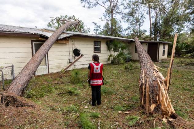 Red Cross disaster responder Dariana Molina assesses damage caused by Hurricane Idalia in Perry, Florida (Scott Dalton/American Red Cross)