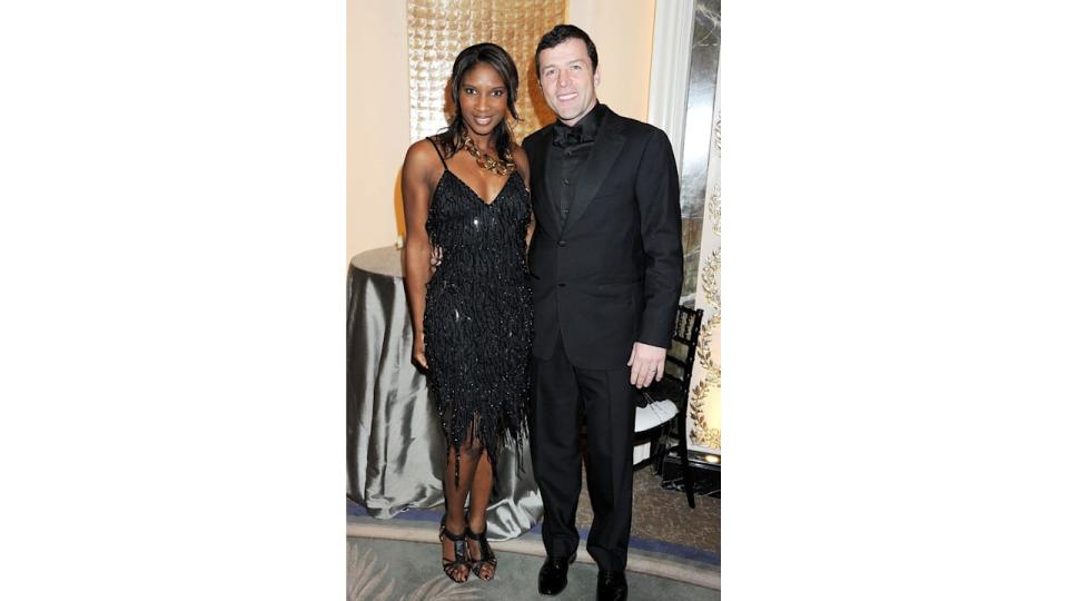 Denise Lewis in a black sparkly dress and Steve Finan O'Connor in a black suit