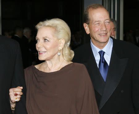 Actress Lauren Bacall arrives with her son Stephen Humphrey Bogart (R) at the Academy of Motion Picture Arts & Sciences 2009 Governor Awards in Hollywood, California, in this file picture taken November 14, 2009. REUTERS/Fred Prouser/Files