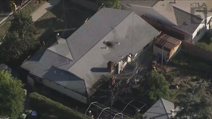 Los Angeles Fire Department crews block off a neighborhood in Chatsworth where a fire was believed to have been intentionally set on Dec. 1, 2023. (KTLA)