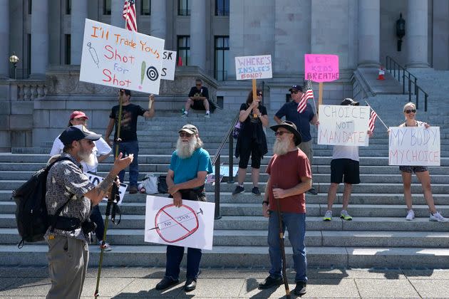 Protesters who oppose facemask and COVID-19 vaccine mandates gather outside the state Capitol building in Olympia, Washington, on Aug. 18. (Photo: via Associated Press)