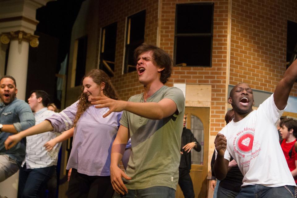 Rachel Thomas, left, as Vanessa, Jorge Rivera-Herrans, as Usnavi, and Pierre Cooks, as Benny, rehearse with the ensemble for South Bend Civic Theatre's 2018 production of "In the Heights."