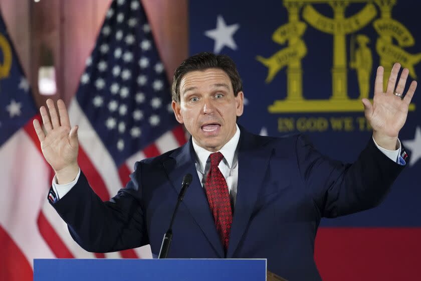 Florida Gov. Ron DeSantis speaks to a crowd at Adventure Outdoors gun store, Thursday, March 30, 2023, in Smyrna, Ga. AP Photo/John Bazemore)