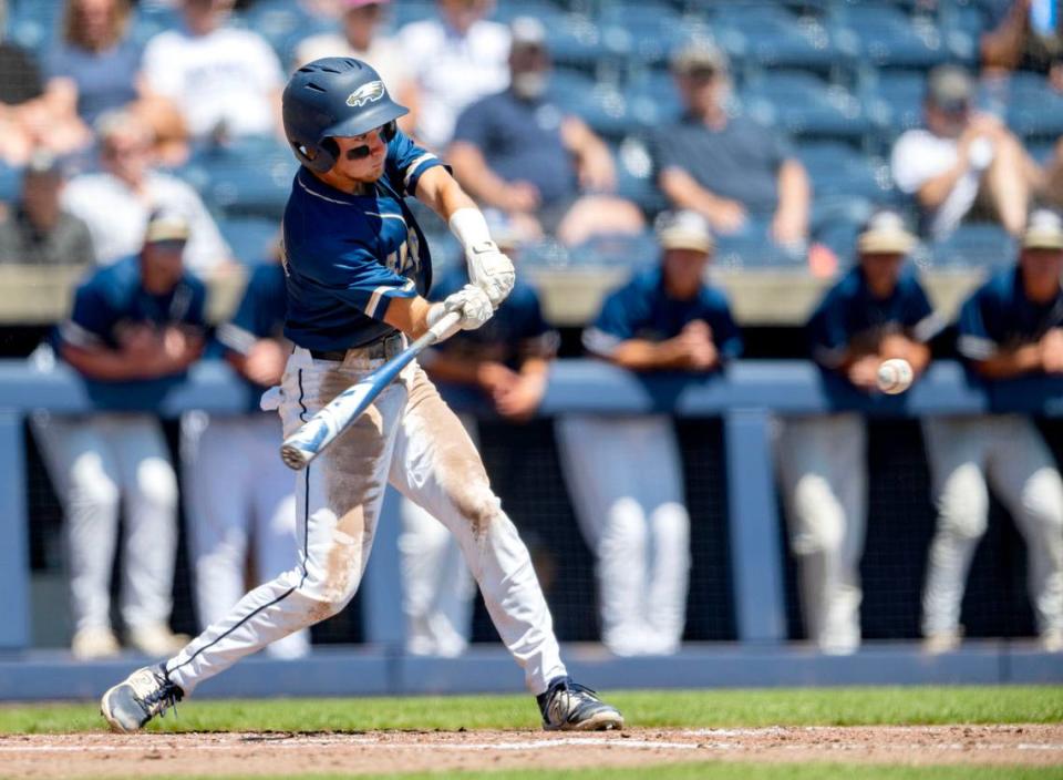 Bald Eagle Area’s Gavin Burns hits a double that scores two runs in the top of the fifth inning of the PIAA 2A championship game against Tri-Valley at Medlar Field on Thursday, June 13, 2024.