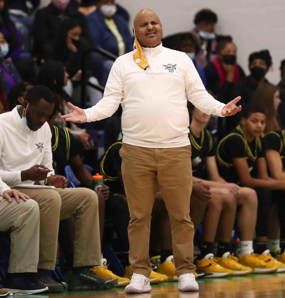 Walnut Hills head coach Ricardo Hill reacts  during the  Eagles win over Winton Woods, Wednesday, Dec. 22 2021.