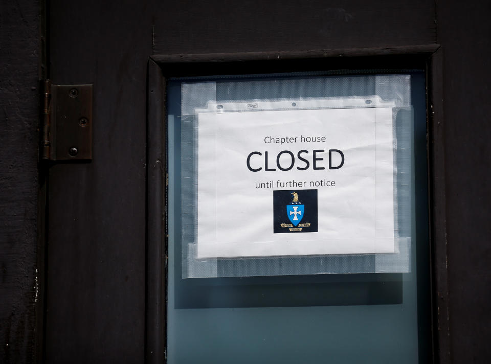 A closed sign is taped to the door of a fraternity house in the Greek Row area at the University of Washington in Seattle, Washington, U.S. August 5, 2020. Picture taken August 5, 2020.  REUTERS/Lindsey Wasson