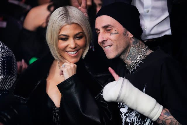 Jeff Bottari/Zuffa LLC via Getty Kourtney Kardashian and Travis Barker in 2023.