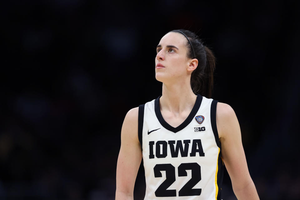 CLEVELAND, OHIO - APRIL 05: Caitlin Clark #22 of the Iowa Hawkeyes looks on in the first half during the NCAA Women's Basketball Tournament Final Four semifinal game against the UConn Huskies at Rocket Mortgage Fieldhouse on April 05, 2024 in Cleveland, Ohio. (Photo by Steph Chambers/Getty Images)